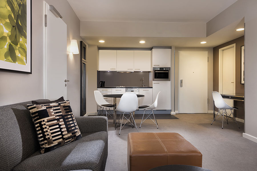 adina apartment hotel hamburg michel one bedroom apartment lounge room and kitchen 2017 900x600