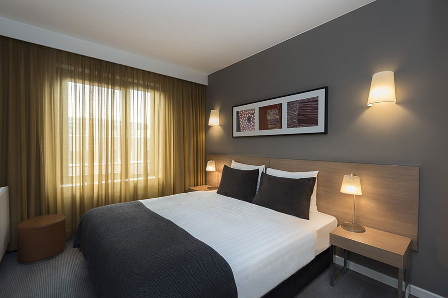 adina apartment hotel hamburg michel two bedroom apartment bedroom 01 2017 900x600